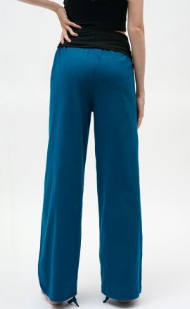 Petrolejové kalhoty Michaela Gautam Sabai